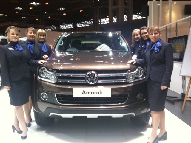 Event staff standing around a VW Amarok